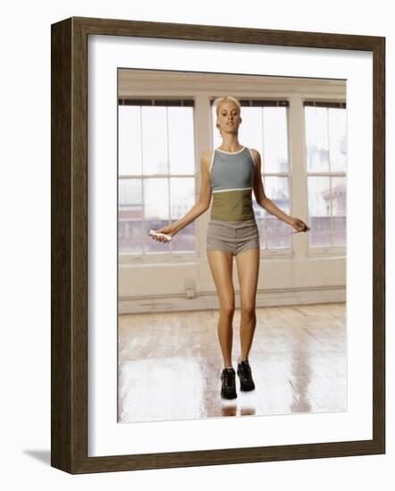 Women Working Out with Jump Rope in Fitness Studio, New York, New York, USA-Chris Trotman-Framed Photographic Print