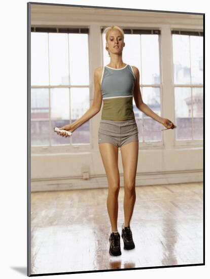 Women Working Out with Jump Rope in Fitness Studio, New York, New York, USA-Chris Trotman-Mounted Photographic Print