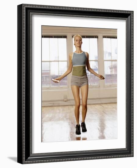 Women Working Out with Jump Rope in Fitness Studio, New York, New York, USA-Chris Trotman-Framed Photographic Print