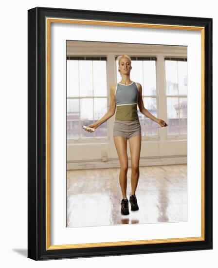 Women Working Out with Jump Rope in Fitness Studio, New York, New York, USA-Chris Trotman-Framed Photographic Print