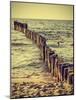 Wood Pilings on Beach, Vintage Retro Effect.-Maciej Bledowski-Mounted Photographic Print