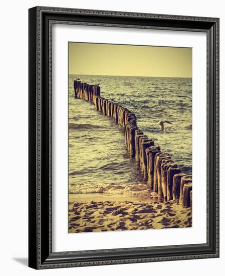 Wood Pilings on Beach, Vintage Retro Effect.-Maciej Bledowski-Framed Photographic Print