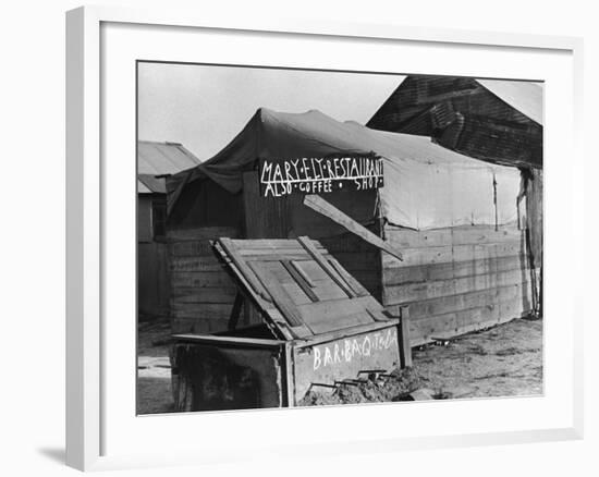 Wooden and Tin Shack with Canvas Roof Housing, Mary Ely Restaurant, Bar B Q Today, in Oil Boomtown-Carl Mydans-Framed Photographic Print
