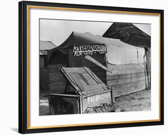 Wooden and Tin Shack with Canvas Roof Housing, Mary Ely Restaurant, Bar B Q Today, in Oil Boomtown-Carl Mydans-Framed Photographic Print