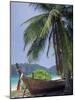 Wooden Boat Beneath Palm Trees on Beach, off the Island of Phuket, Thailand-Ruth Tomlinson-Mounted Photographic Print