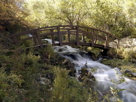 Wooden Bridge Over A Flowing Stream Photographic Print Art Com Wooden Bridge Over A Flowing Stream Photographic Print Art Com