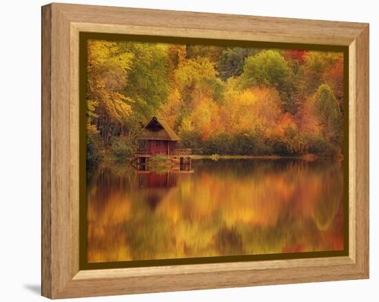 Wooden Cabin on Lake in Autumn-Robert Llewellyn-Framed Premier Image Canvas