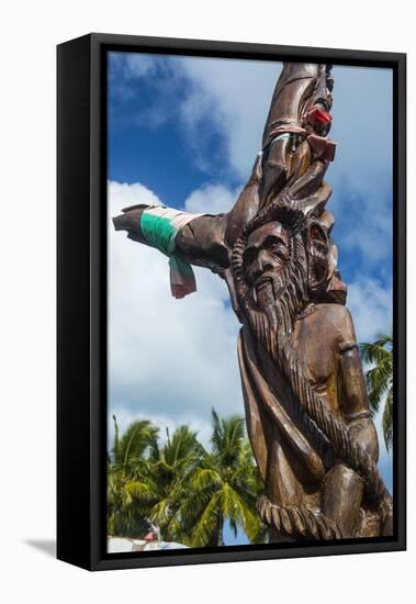 Wooden carvings on the Monument des Dix-Neuf (Monument of 19), Ouvea, Loyalty Islands, New Caledoni-Michael Runkel-Framed Premier Image Canvas