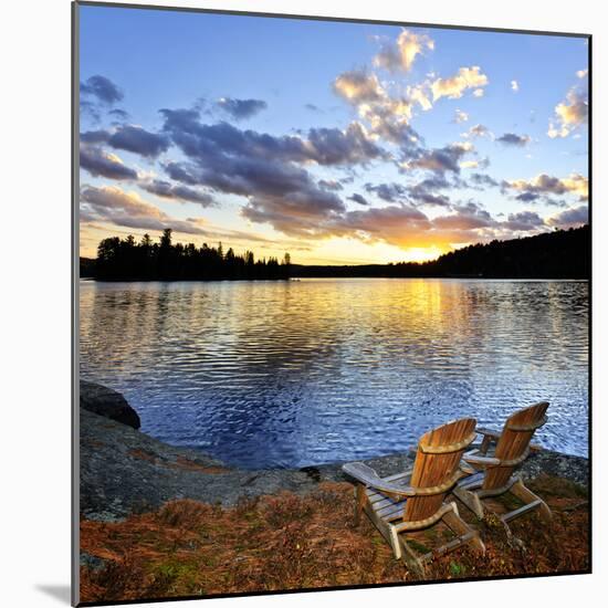 Wooden Chair on Beach of Relaxing Lake at Sunset in Algonquin Park, Canada-elenathewise-Mounted Photographic Print