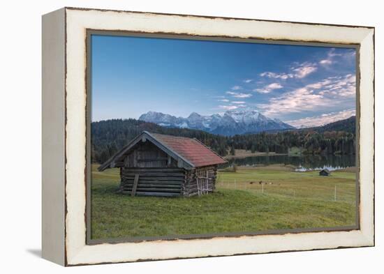 Wooden hut frames the alpine lake surrounded by the Alps, Geroldsee, Krun, Garmisch Partenkirchen, -Roberto Moiola-Framed Premier Image Canvas