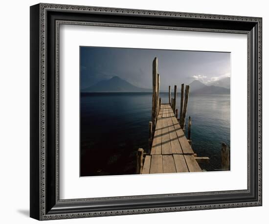 Wooden Jetty and Volcanoes in the Distance, Lago Atitlan (Lake Atitlan), Guatemala, Central America-Colin Brynn-Framed Photographic Print