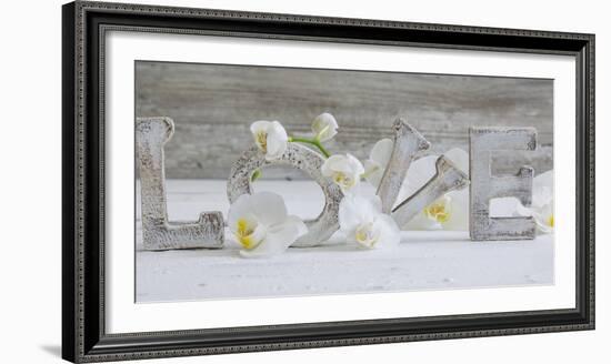 Wooden Letters 'Love' with Orchid Blossoms-Uwe Merkel-Framed Photographic Print