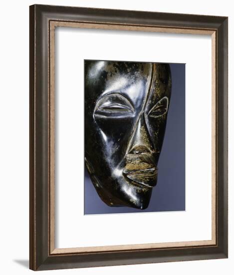 Wooden mask of a type called a Deangle, Dan-Ngere tribal complex, West Africa-Werner Forman-Framed Photographic Print