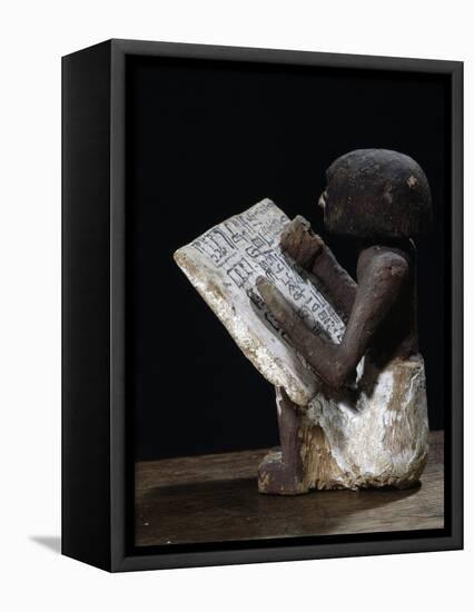 Wooden model of a scribe, Ancient Egyptian, possibly Middle Kingdom-Werner Forman-Framed Premier Image Canvas