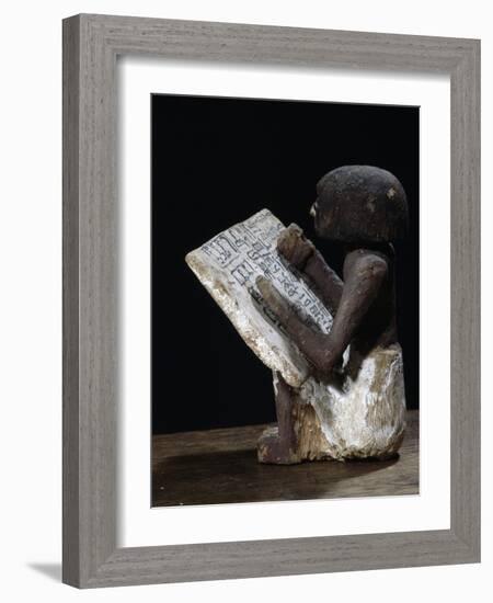 Wooden model of a scribe, Ancient Egyptian, possibly Middle Kingdom-Werner Forman-Framed Photographic Print