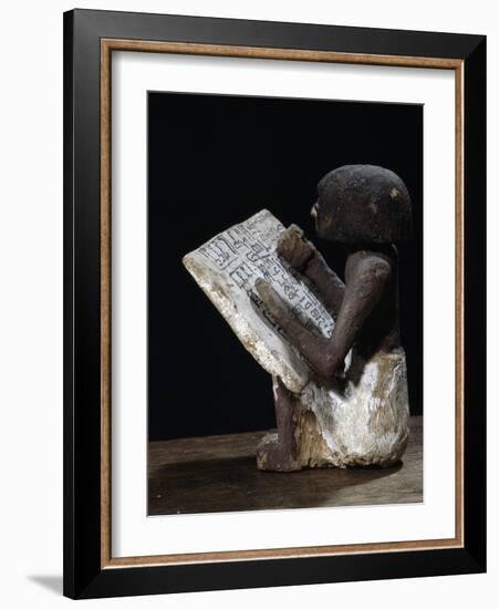 Wooden model of a scribe, Ancient Egyptian, possibly Middle Kingdom-Werner Forman-Framed Photographic Print