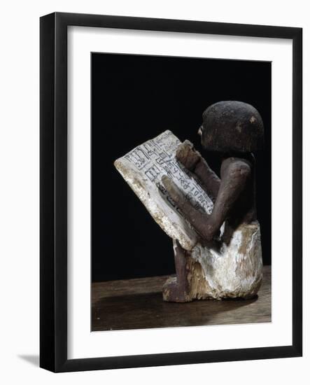 Wooden model of a scribe, Ancient Egyptian, possibly Middle Kingdom-Werner Forman-Framed Photographic Print