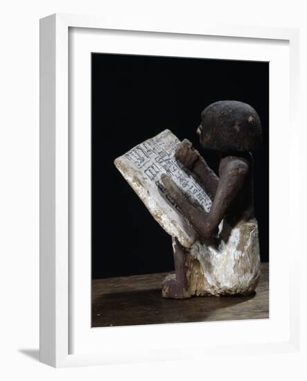 Wooden model of a scribe, Ancient Egyptian, possibly Middle Kingdom-Werner Forman-Framed Photographic Print