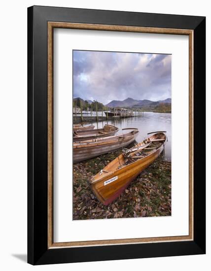 Wooden rowing boats beside Derwent Water in the Lake District, Cumbria, England. Autumn (October) 2-Adam Burton-Framed Photographic Print