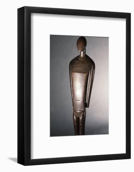 Wooden statue of a female deity, Nukuoro Island, Caroline Islands, 18th-19th century-Werner Forman-Framed Photographic Print