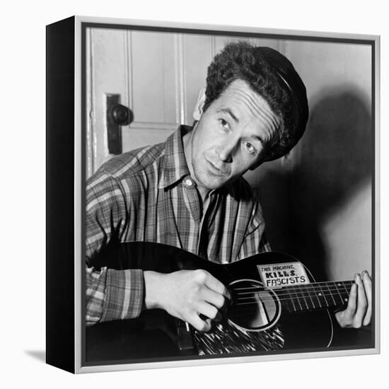 Woody Guthrie (1912-1967)-Al Aumuller-Framed Premier Image Canvas