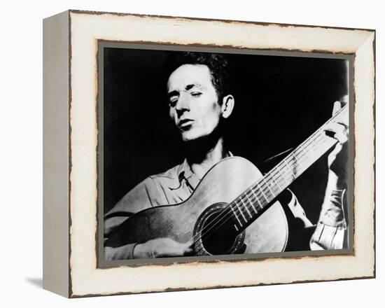 Woody Guthrie (1912-1967)-null-Framed Premier Image Canvas