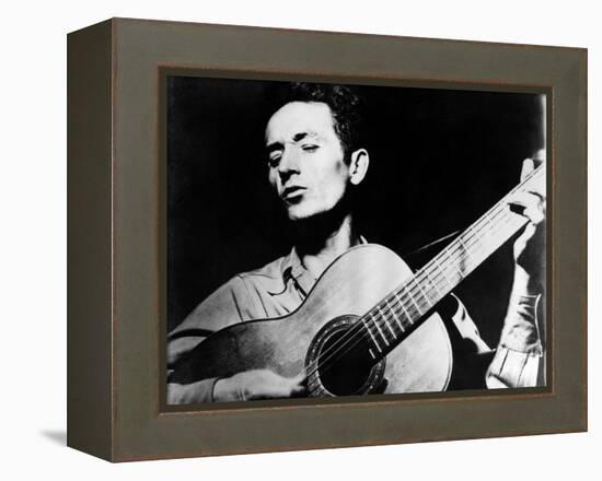 Woody Guthrie (1912-1967)-null-Framed Premier Image Canvas