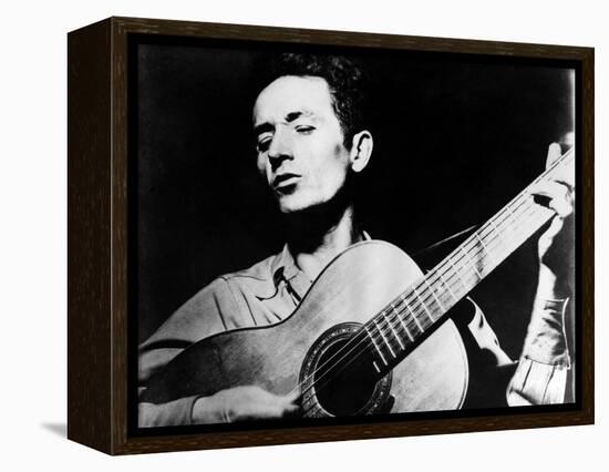 Woody Guthrie (1912-1967)-null-Framed Premier Image Canvas