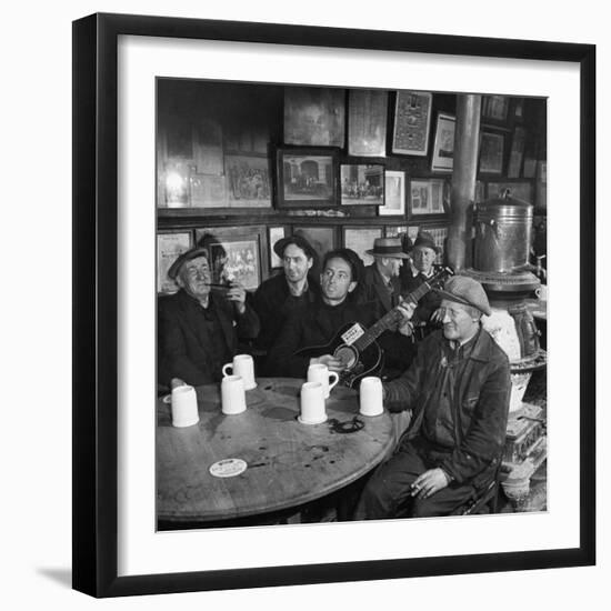 Woody Guthrie Playing and Singing for Patrons of Mcsorley's Bar-Eric Schaal-Framed Premium Photographic Print