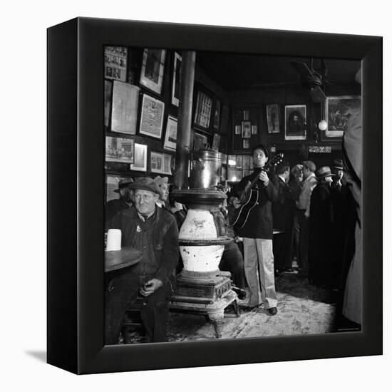 Woody Guthrie Playing in McSorley's Pub-Eric Schaal-Framed Premier Image Canvas