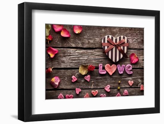 Word Love With Heart Shaped Valentines Day Gift Box On Old Vintage Wooden Plates-ouh_desire-Framed Photographic Print