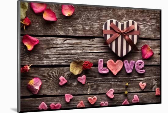 Word Love With Heart Shaped Valentines Day Gift Box On Old Vintage Wooden Plates-ouh_desire-Mounted Photographic Print