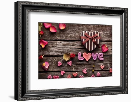 Word Love With Heart Shaped Valentines Day Gift Box On Old Vintage Wooden Plates-ouh_desire-Framed Photographic Print