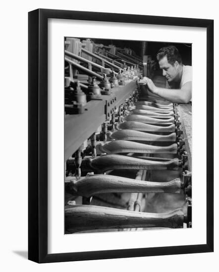 Worker Carving Chair Legs, 24 at a Time, at a Tomlinson Furniture Factory-Margaret Bourke-White-Framed Photographic Print