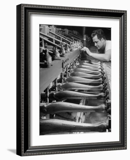 Worker Carving Chair Legs, 24 at a Time, at a Tomlinson Furniture Factory-Margaret Bourke-White-Framed Photographic Print