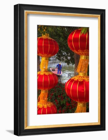Worker in Boat Cleaning Green Lake, Kunming China-Darrell Gulin-Framed Photographic Print