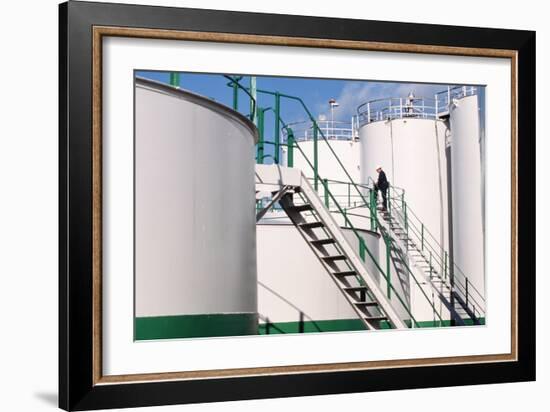 Worker Inspecting An Oil Storage Tank-Geoff Tompkinson-Framed Photographic Print