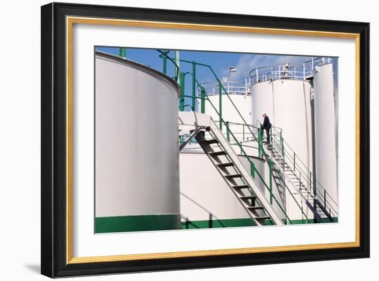 Worker Inspecting An Oil Storage Tank-Geoff Tompkinson-Framed Photographic Print