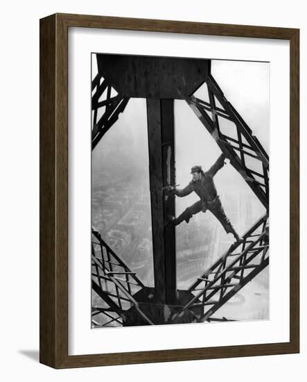 Worker Painting the Eiffel Tower-null-Framed Photo