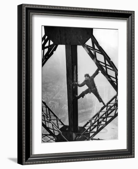 Worker Painting the Eiffel Tower-null-Framed Photo