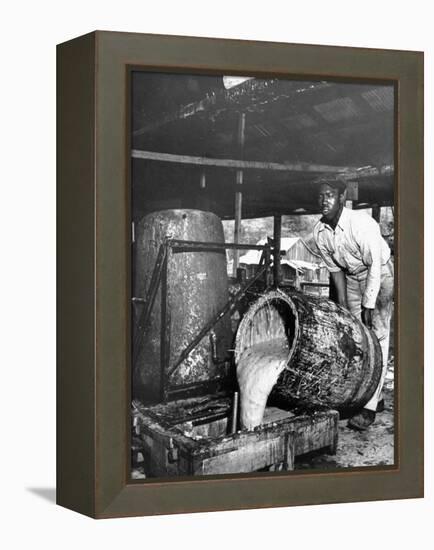 Worker Pouring Gum from Pine Trees into a Still During Turpentine Production-Hansel Mieth-Framed Premier Image Canvas