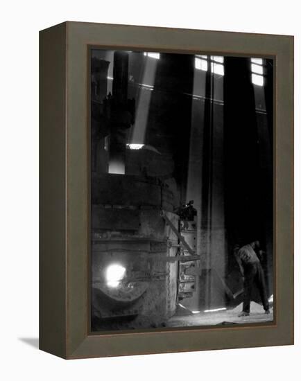 Worker Shoveling Limestone Into an Electric Blast Furnace at Republic Steel Mill-Margaret Bourke-White-Framed Premier Image Canvas