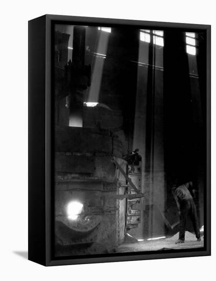 Worker Shoveling Limestone Into an Electric Blast Furnace at Republic Steel Mill-Margaret Bourke-White-Framed Premier Image Canvas