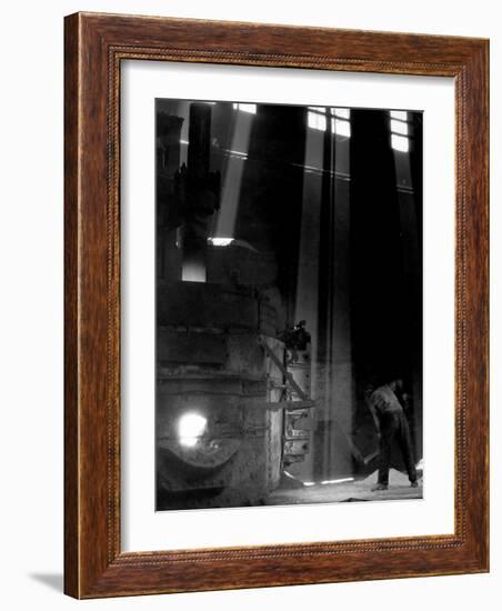 Worker Shoveling Limestone Into an Electric Blast Furnace at Republic Steel Mill-Margaret Bourke-White-Framed Photographic Print