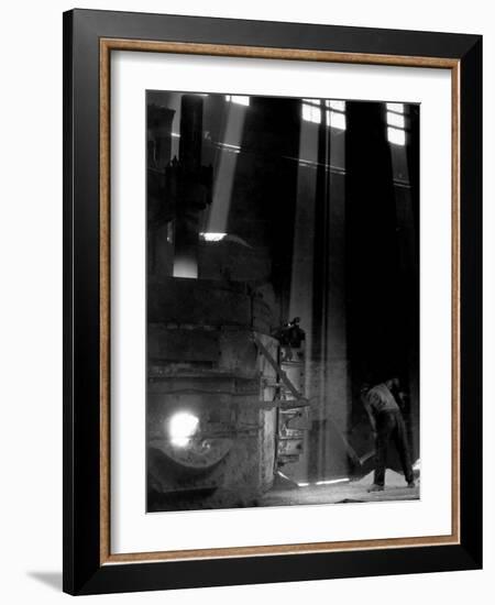 Worker Shoveling Limestone Into an Electric Blast Furnace at Republic Steel Mill-Margaret Bourke-White-Framed Photographic Print