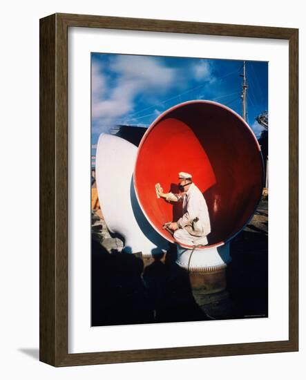 Worker Sitting Inside Ship's Ventilator paint inside Sun Shipbuilding and Dry Dock Co. Shipyards-Dmitri Kessel-Framed Photographic Print