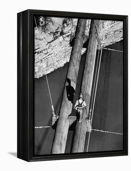 Worker Walking on the Texas Illinois Natural Gas Company's Pipeline Suspension Bridge-John Dominis-Framed Premier Image Canvas