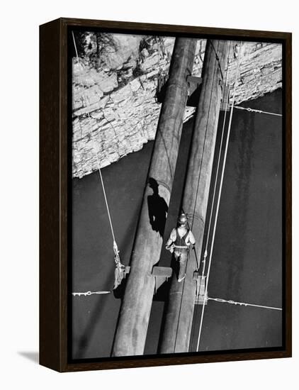 Worker Walking on the Texas Illinois Natural Gas Company's Pipeline Suspension Bridge-John Dominis-Framed Premier Image Canvas