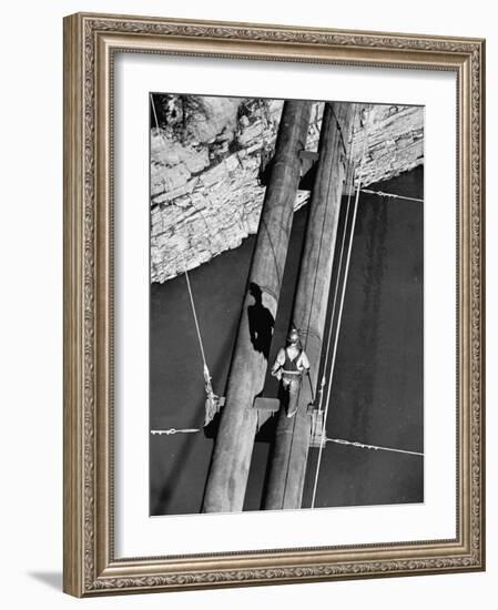 Worker Walking on the Texas Illinois Natural Gas Company's Pipeline Suspension Bridge-John Dominis-Framed Photographic Print