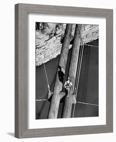 Worker Walking on the Texas Illinois Natural Gas Company's Pipeline Suspension Bridge-John Dominis-Framed Photographic Print